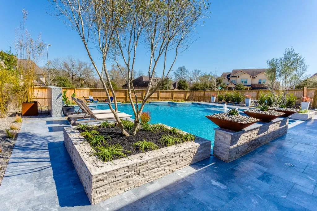 pool white stone walls limestone landscaping