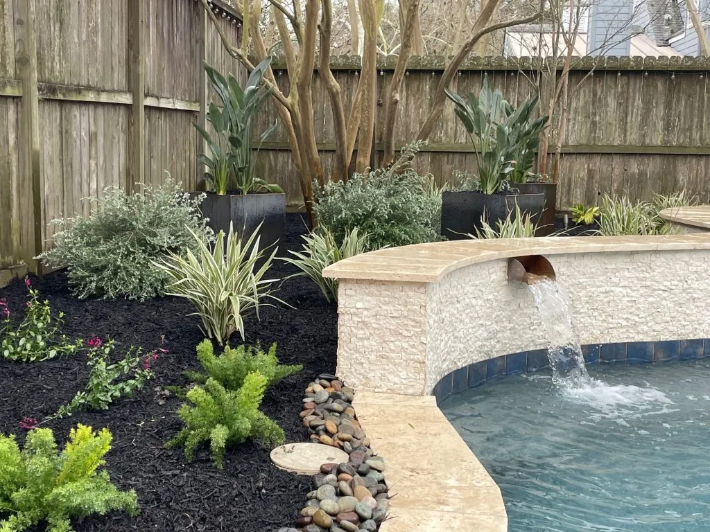 professional landscaping around pool