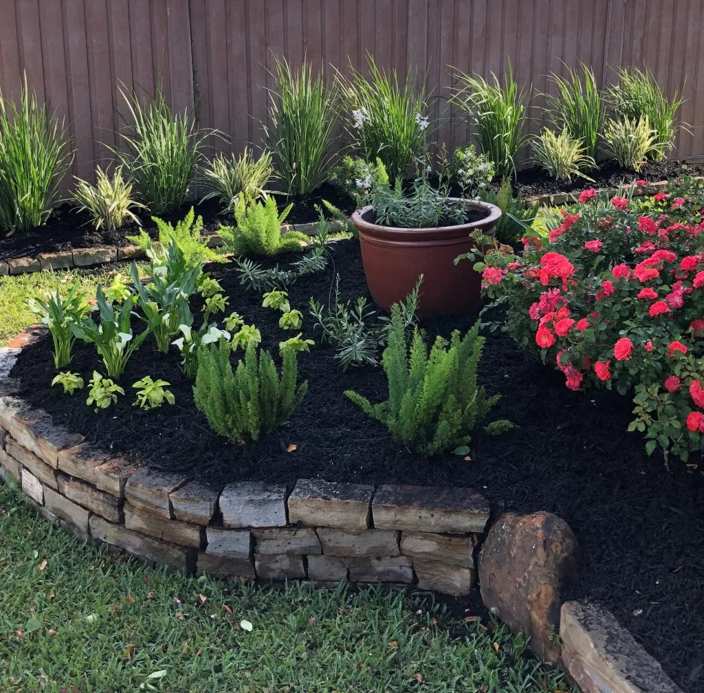 flowerbed landscaping chopped stone edging Fulshear Houston Katy