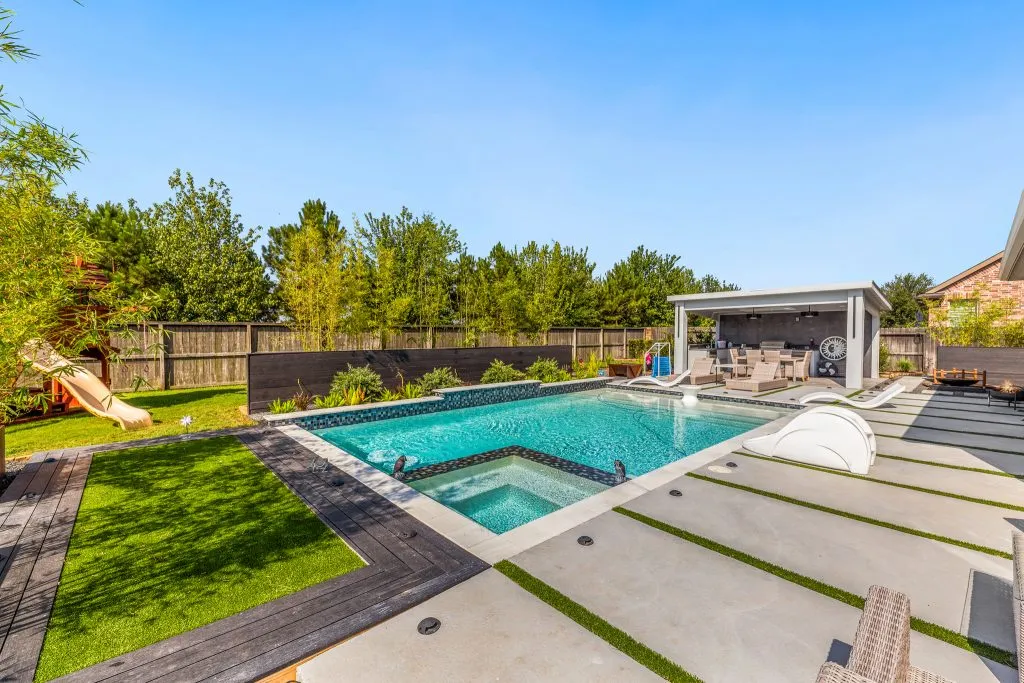 Rectangular pool with built-in spa hot tub