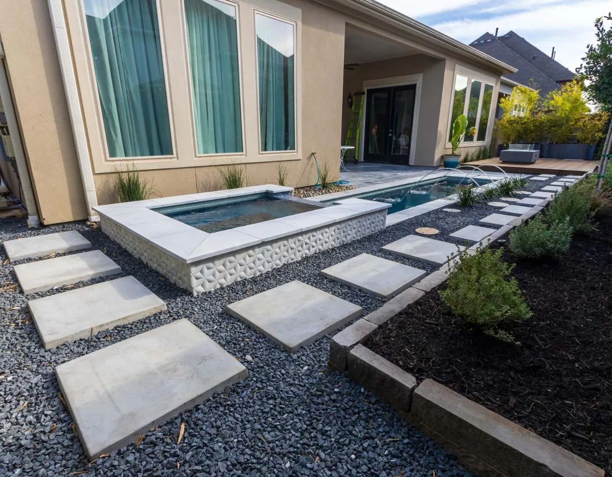 stone patio built-in hot tub hardscapes Houston Katy Fulshear Richmond
TX