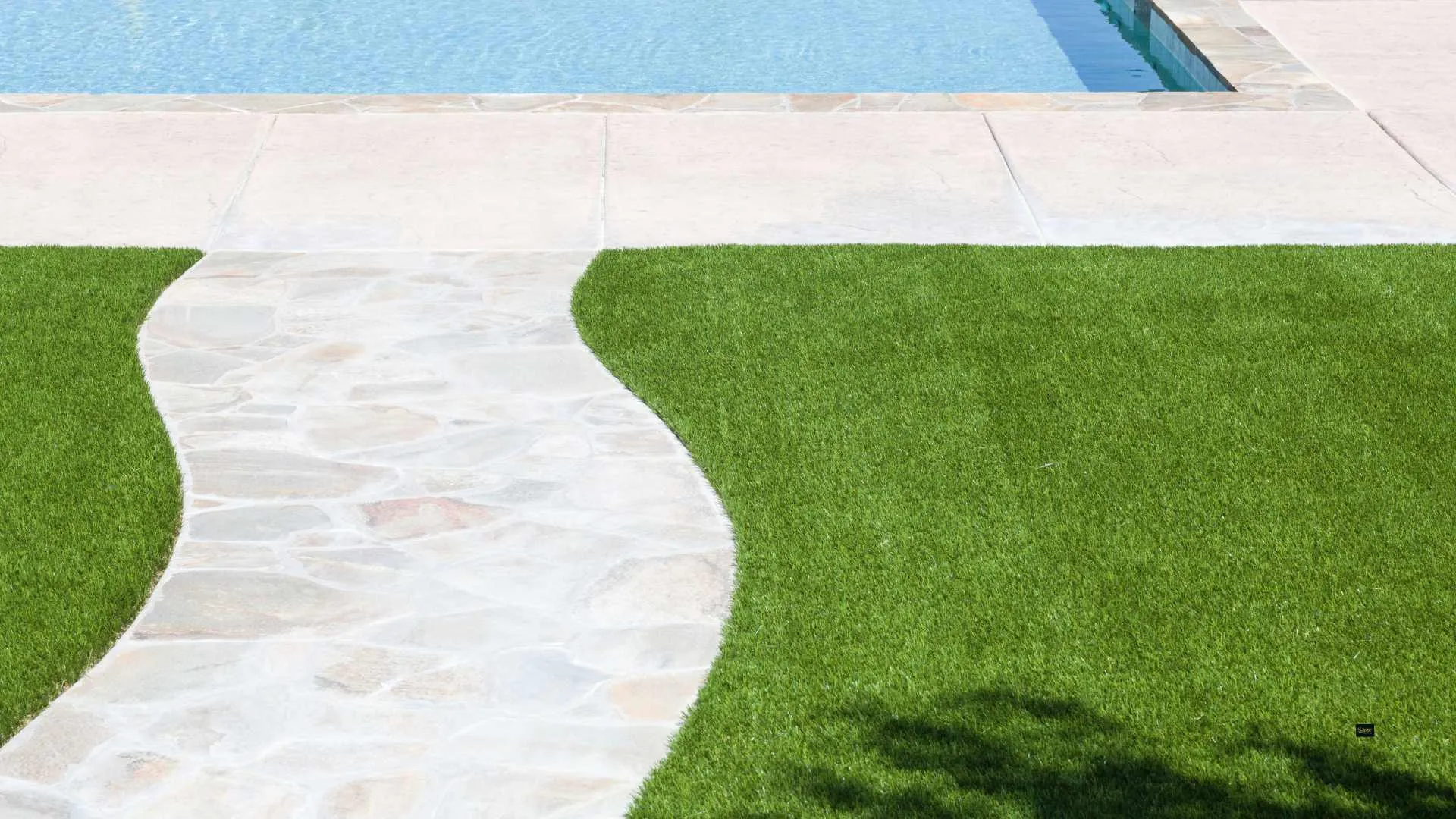 artificial grass turf installed around pool Houston Fulshear Katy Cypress TX